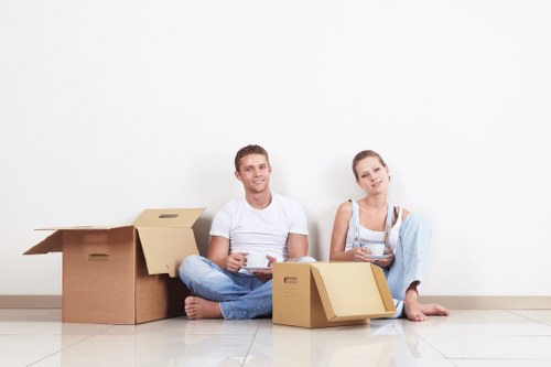 Professional movers loading furniture into a removal van in Marylebone
