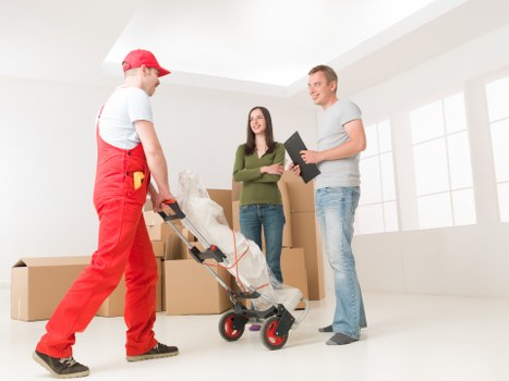 Packed boxes and furniture ready for flat removals in Marylebone