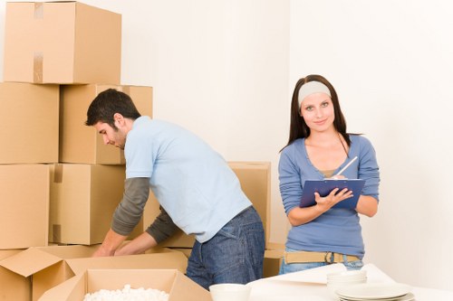 Packed moving boxes and furniture ready for removal services in Marylebone