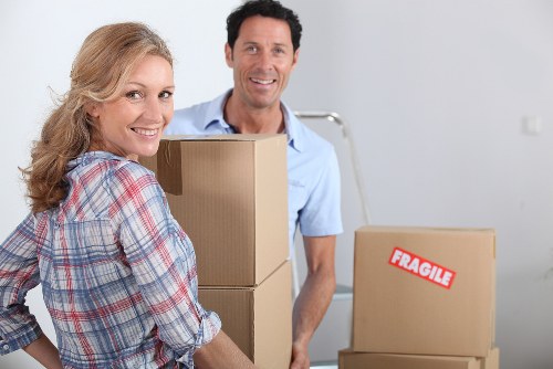 Professional movers loading household furniture in Marylebone