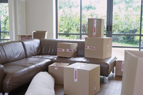 Loading belongings into a removal truck in central London